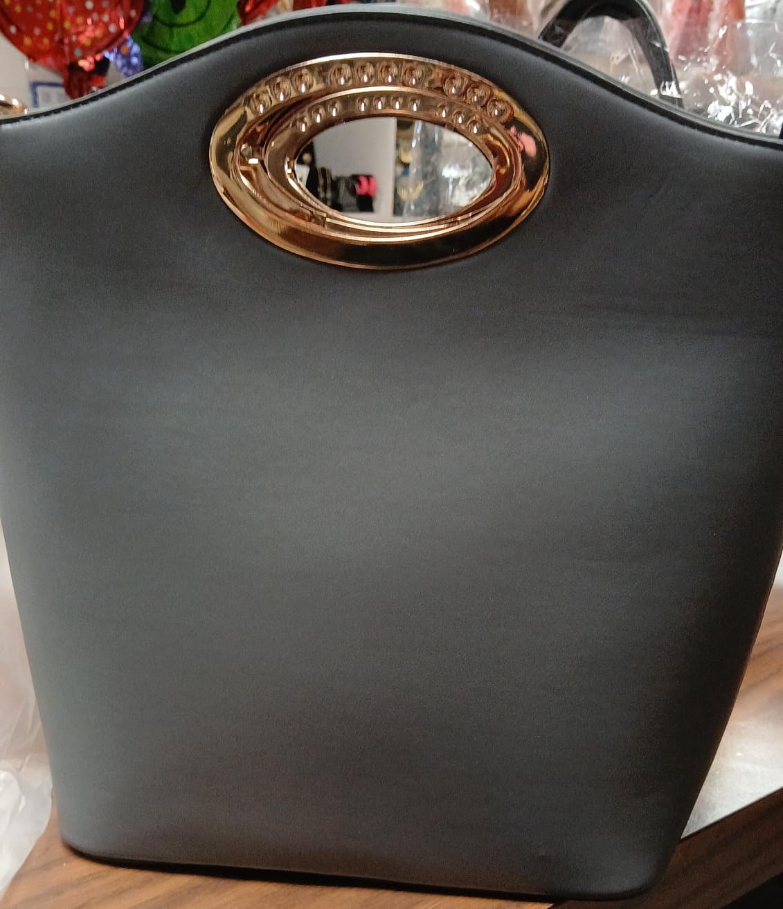 cartera de maNO GRIS Y ROJA